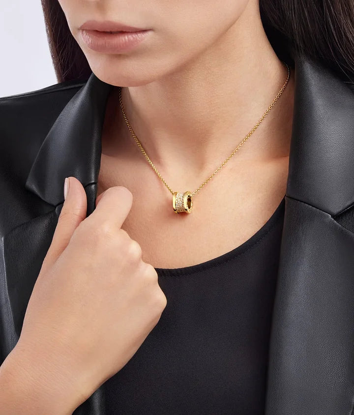 Bob Rollers Adolph yellow gold pendant necklace with chain and pavé diamonds set on the spiral