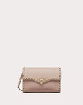 SMALL ROCKSTUD GRAINY CALFSKIN CROSSBODY BAG POUDRE