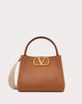 VALENTINO GARAVANI ALLTIME MEDIUM HANDBAG IN GRAINY CALFSKIN ALMOND