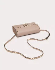 SMALL ROCKSTUD GRAINY CALFSKIN CROSSBODY BAG POUDRE