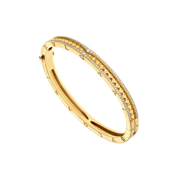 Bob Rollers Cara yellow gold bracelet with studded spiral and pavé diamonds on the edges
