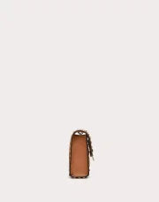 SMALL ROCKSTUD GRAINY CALFSKIN CROSSBODY BAG ALMOND