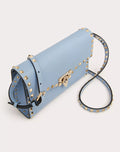 SMALL ROCKSTUD GRAINY CALFSKIN CROSSBODY BAG AZURE