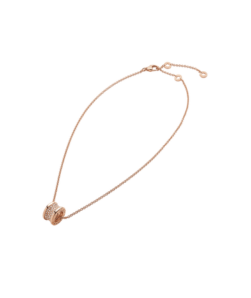 Bob Rollers Adolph necklace with 18 kt rose gold chain and rose gold pendant set with pavé diamonds on the spiral.