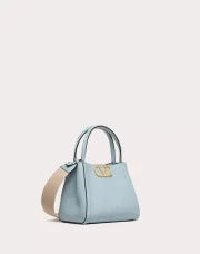 VALENTINO GARAVANI ALLTIME SMALL HANDBAG IN GRAINY CALFSKIN PORCELAIN BLUE