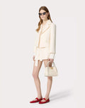 VALENTINO GARAVANI ALLTIME SMALL HANDBAG IN GRAINY CALFSKIN IVORY