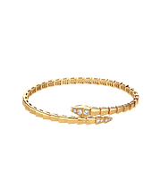 Bob snake fad yellow gold bracelet set with pavé diamonds on the head and tail
