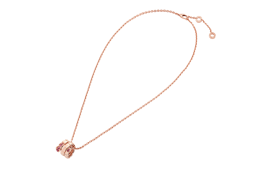 Bob Snake elegant rose gold pendant necklace set with rubies on the head.