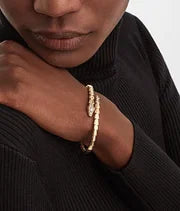 Bob snake fad yellow gold bracelet set with pavé diamonds on the head and tail