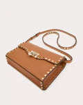SMALL ROCKSTUD GRAINY CALFSKIN CROSSBODY BAG ALMOND