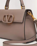 SMALL VSLING GRAINY CALFSKIN HANDBAG