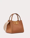VALENTINO GARAVANI ALLTIME MEDIUM HANDBAG IN GRAINY CALFSKIN ALMOND