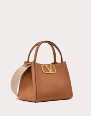 VALENTINO GARAVANI ALLTIME MEDIUM HANDBAG IN GRAINY CALFSKIN ALMOND