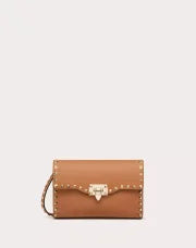 SMALL ROCKSTUD GRAINY CALFSKIN CROSSBODY BAG ALMOND