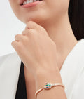 Bob snake fad rose gold bangle bracelet set with blue sapphire eyes